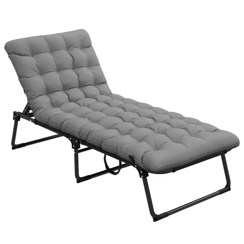 Gray folding lounge chair on a white background